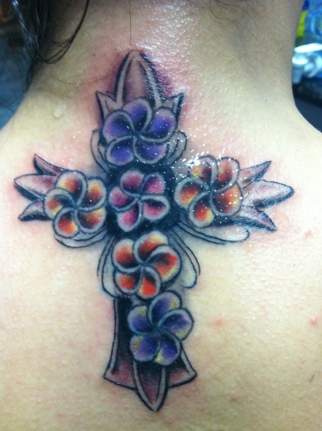 Plumeria cross tattoo