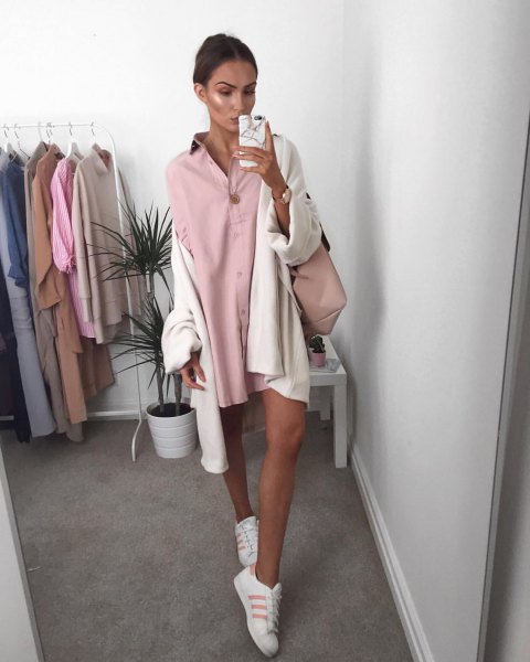 Mini shirt dress with pink buttons and white oversized cardigan