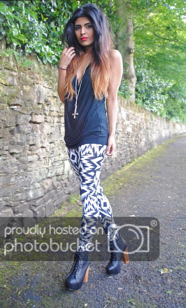 gray tank top with black and white leggings with zig zag print