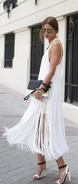 white maxi dress with fringes and high division