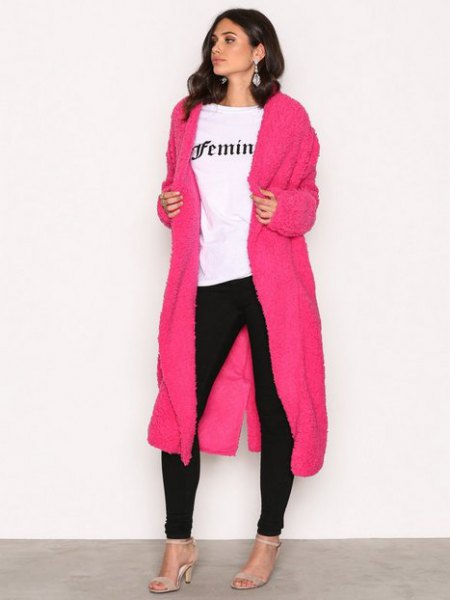 shocking pink maxi coat black skinny jeans