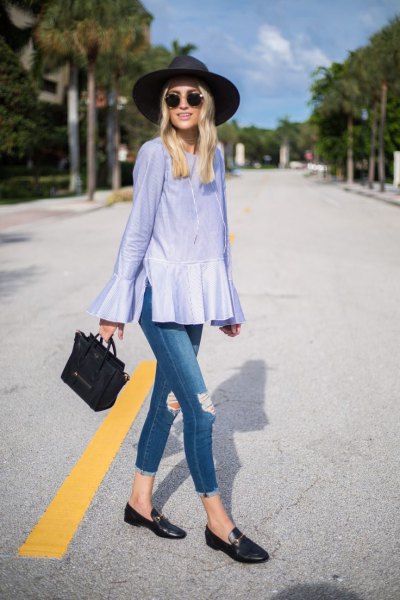 light blue peplum blouse with bell sleeves and black casual shoes