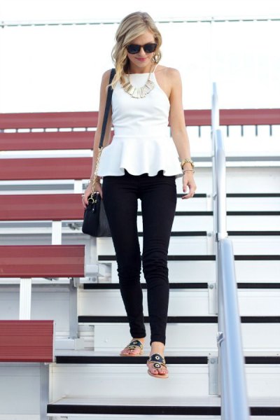 white halter peplum blouse with black drainpipe pants