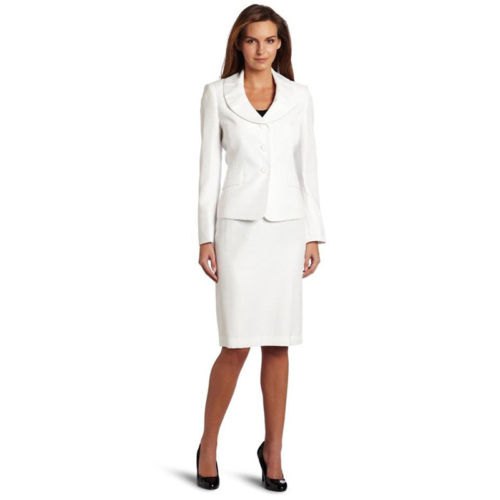 white blazer with round collar, skirt and black rounded leather heels