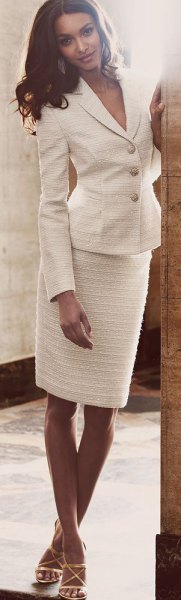 white skirt suit with open toe straps and high heels