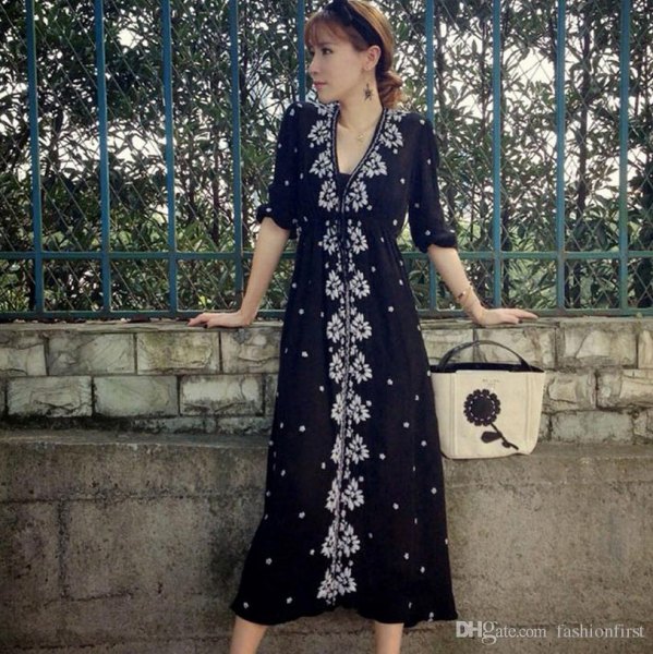 black midi dress with floral button at front