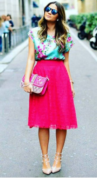 Light blue floral print sleeveless silk blouse and pink midi skirt