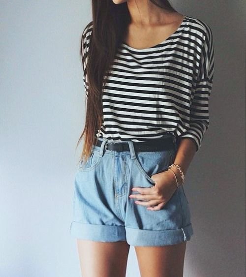 Black and white striped long-sleeved t-shirt with high-waisted, cuffed denim shorts