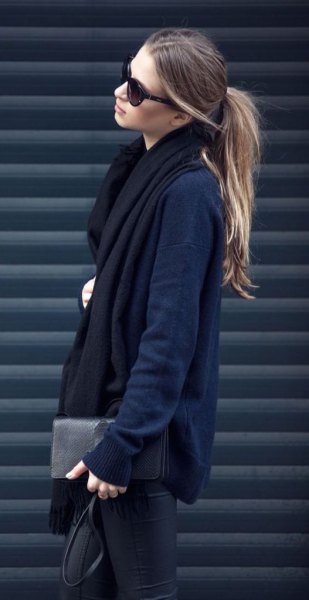 Navy cardigan with black long scarf and leather pants