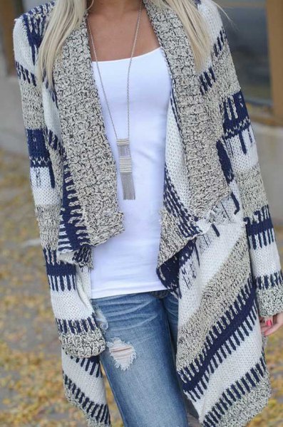 dark blue and gray striped longline cardigan with light blue jeans