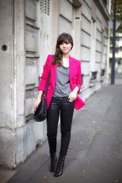 pink slightly oversized blazer with gray t-shirt and leather pants