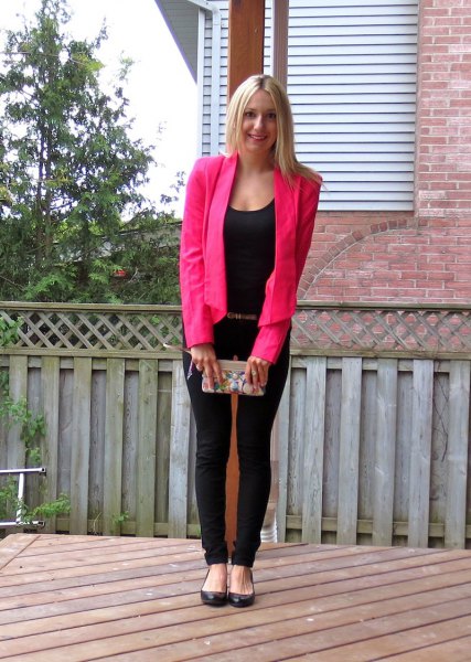pink blazer with an all black outfit