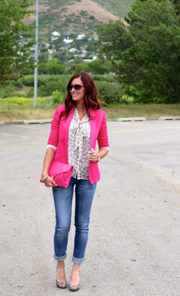 Blouse with white bow pattern and neon pink blazer and jeans