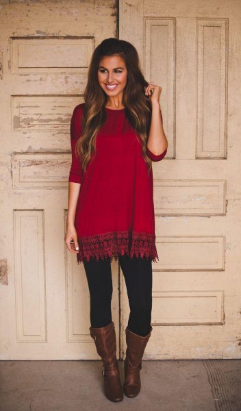 red and black tribal print tunic and mid-calf leather boots