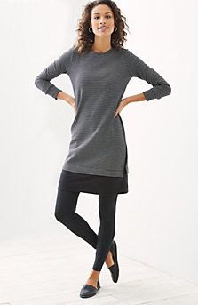 gray long-sleeved tunic top with black leggings and leather loafers