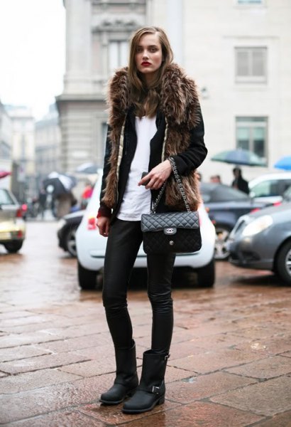 black faux fur coat with leather pants and matte motor boots