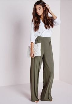white wrap blouse with gray pants with high waist and wide legs