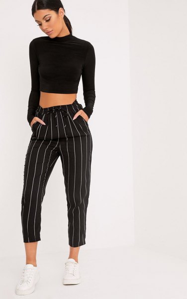black cropped turtleneck sweater and striped cropped wide-leg pants