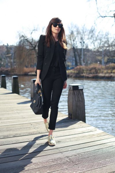 black blazer with cropped chinos and gold low-top sneakers