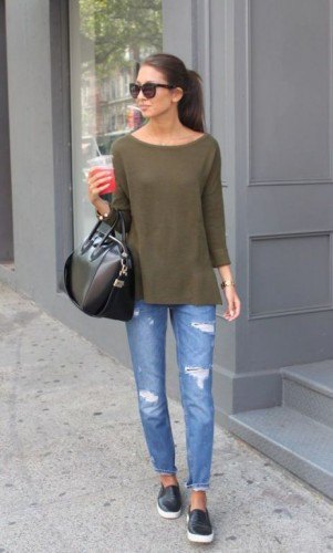 green long-sleeved boat-neck t-shirt and ripped slim-fit jeans