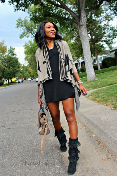 gray cardigan with black mini dress and fall boots with mid-calf fringes