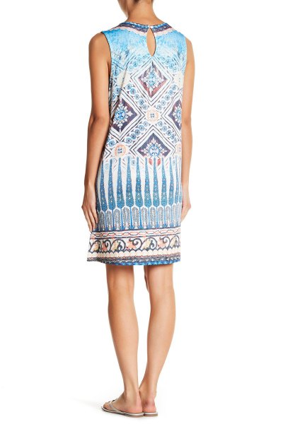 Sleeveless blue and white tribal print tunic dress with slide sandals