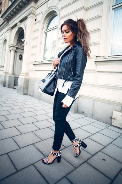 black moto jacket with white relaxed fit chiffon blouse