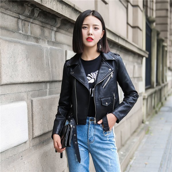 black cropped leather jacket with printed t-shirt and blue slim fit jeans
