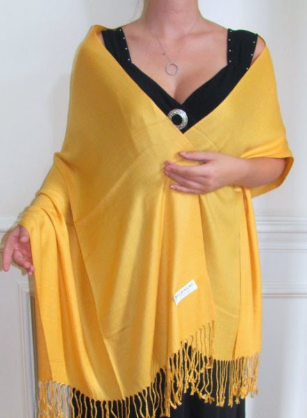 Lemon yellow scarf with fringes and black deep V-neck midi dress