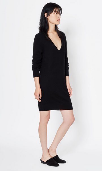 Long sleeved black cashmere mini dress with a deep V neckline