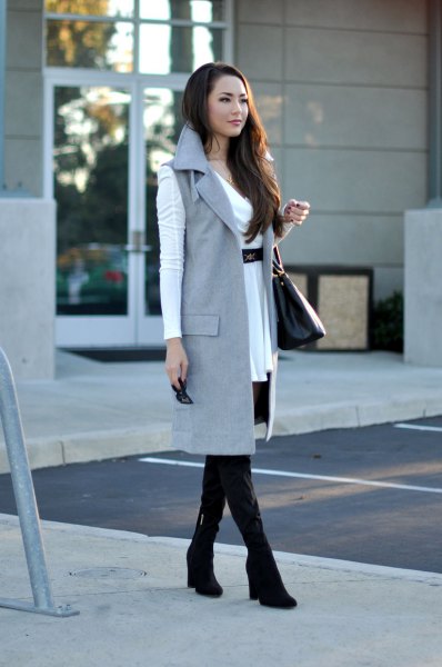 white belted mini dress and gray sleeveless long jacket
