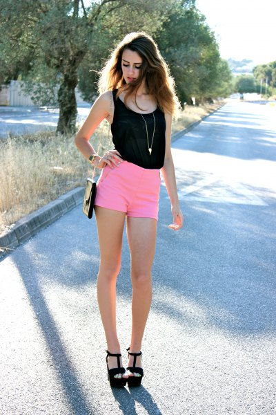 black vest top with high waist mini shorts and black sandals