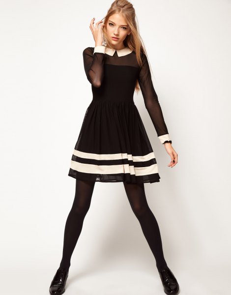 black and white striped, semi-transparent and flared mini dress