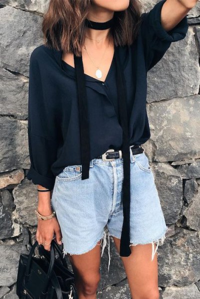 black chiffon blouse with a V-neckline and a thin summer scarf