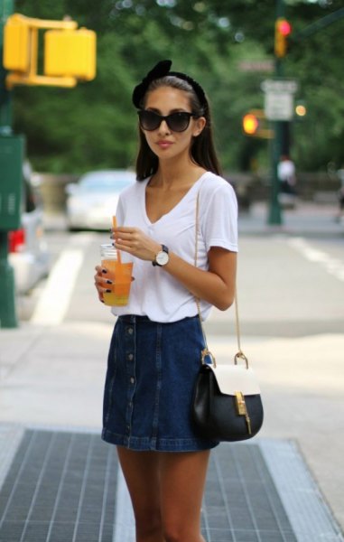 white V-neck t-shirt and skirt with jeans button in front