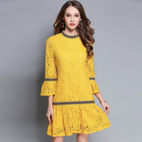 yellow flared dress with bell sleeves
