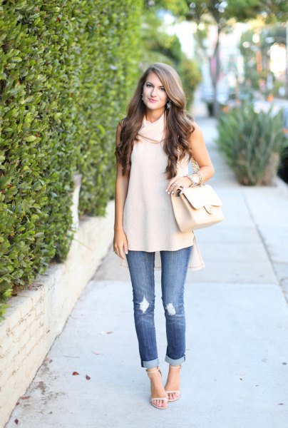 Sleeveless pullover jeans with a cream cowl neckline