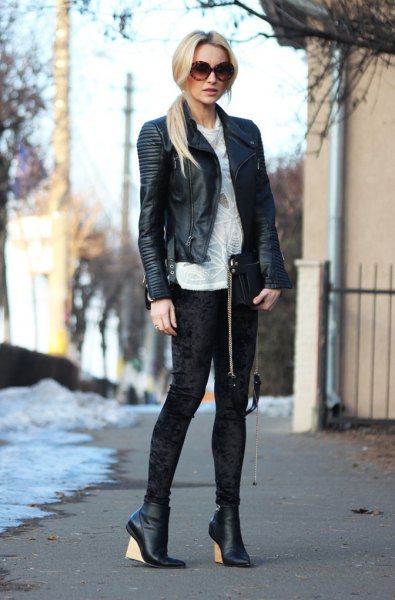 black leather blazer with white velvet leggings