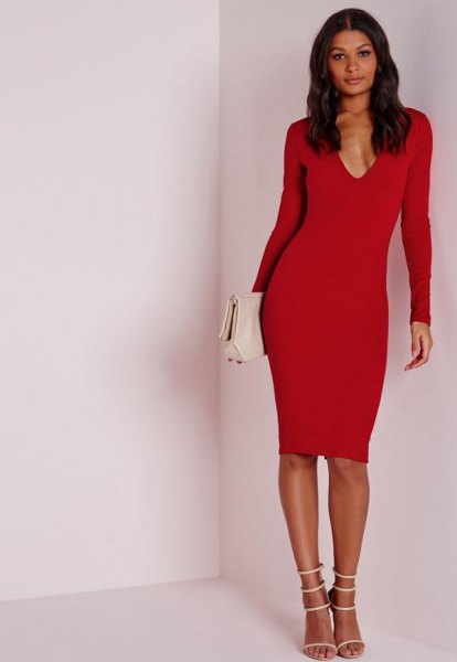 Red long sleeve deep V neck midi dress with white open toe heels