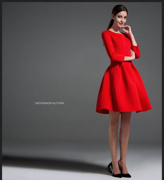 red long-sleeved mini dress with black ballet flats