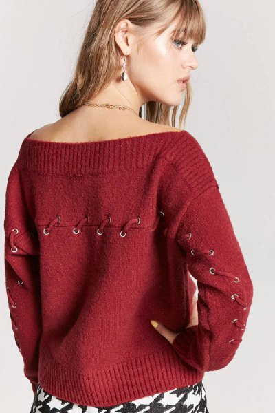 red sweater with lace details with boat neckline