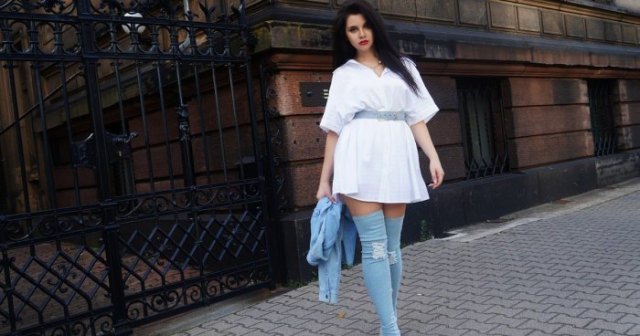 belted white mini dress and thigh-high denim boots