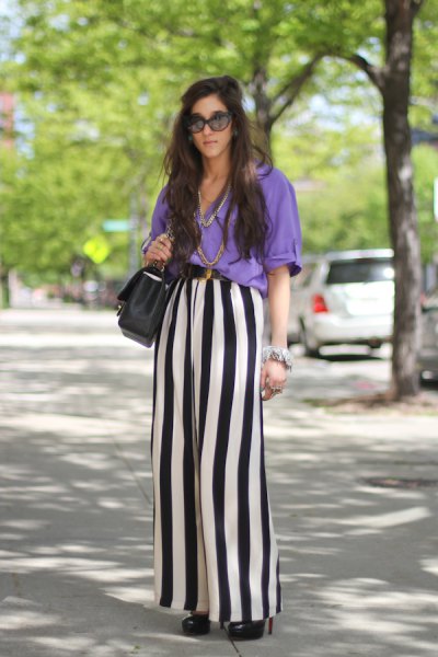 sky blue blouse with black and white striped wide-leg pants