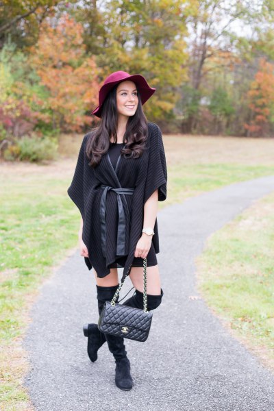 black poncho with belt and belt