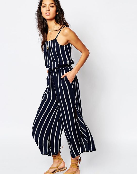 Black and white jumpsuit with black stripes