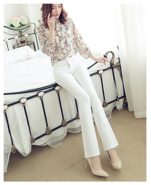 blush pink printed button shirt with white jeans