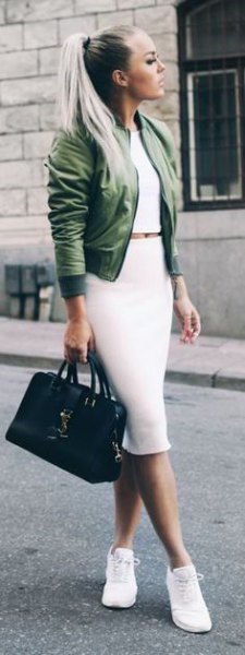 green cropped bomber jacket with white fitted midi skirt