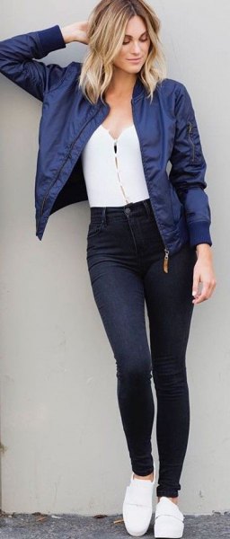 Navy blue cropped bomber jacket with white top