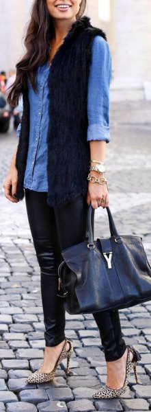 blue chambray shirt with buttons and black fur vest