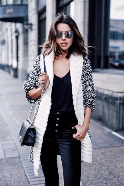 white and black printed longline cardigan with velvet trousers